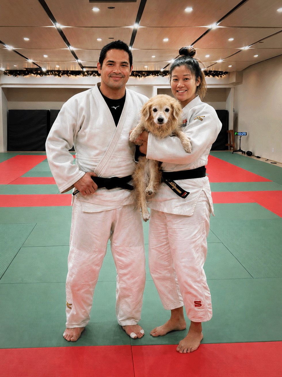 Coaches Jacob Flores and Leilani Akiyama on the mats at San Diego Judo
